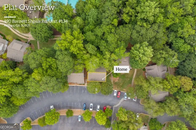 an aerial view of a house with yard swimming pool and outdoor seating