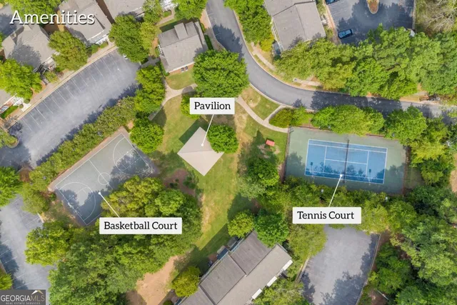 a sign that is sitting on a brick wall