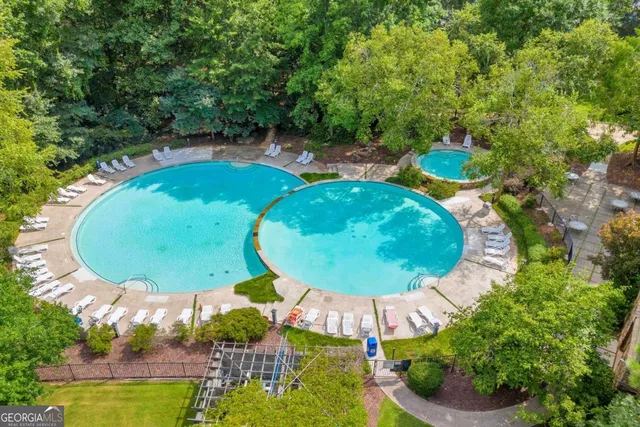 an aerial view of a swimming pool