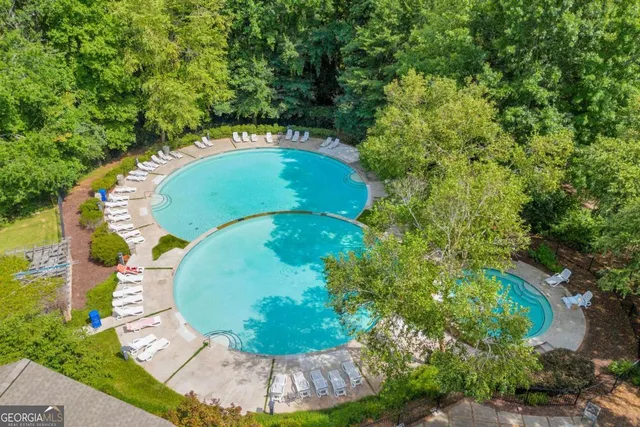 an aerial view of a swimming pool