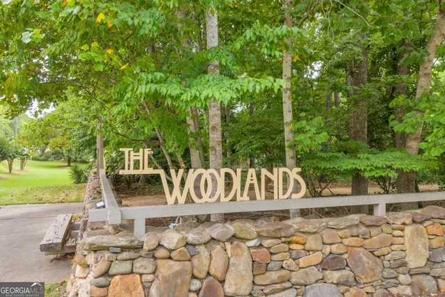 a view of house with backyard space and patio