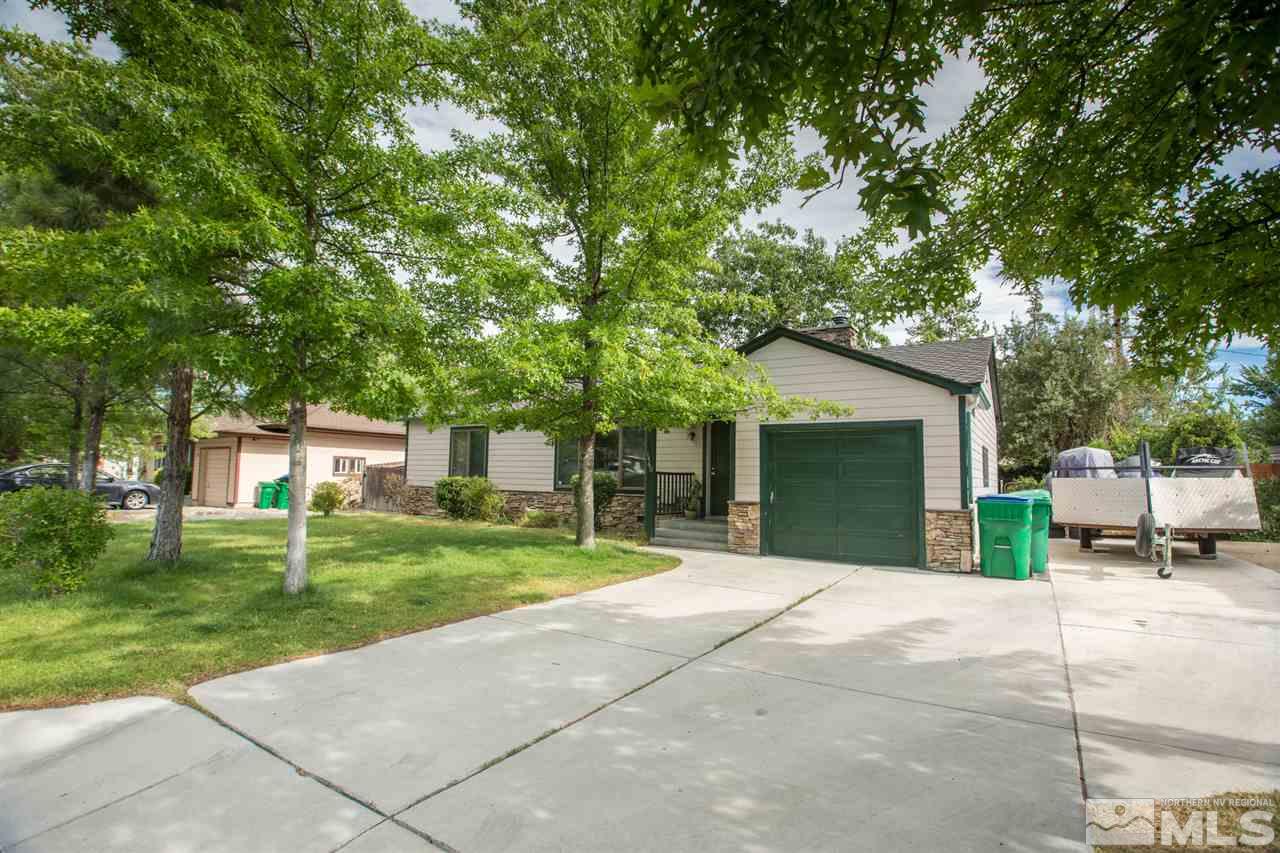 1460 Allen Street Reno, NV 89509 - Photo 1 of 1 front view of a house with a yard and trees