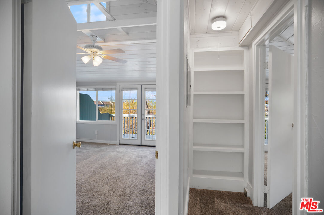3945 Las Flores Canyon Road Malibu, CA 90265 - Photo 25 of 45 a view of a room that has a bed and a window in it