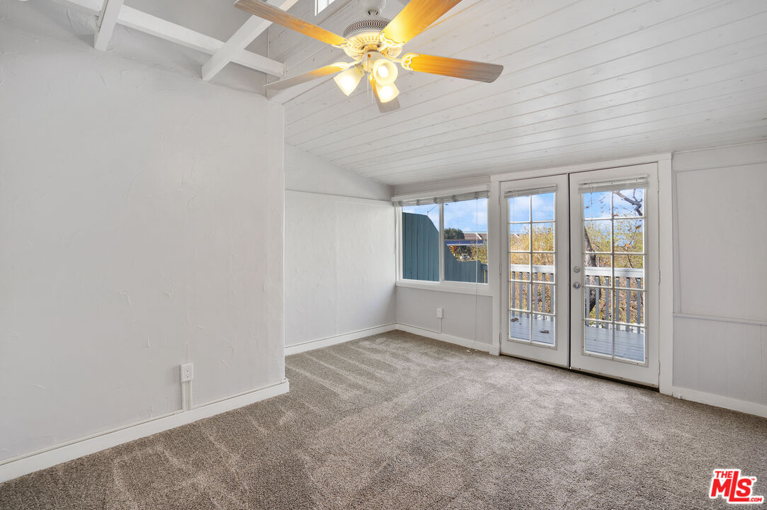 3945 Las Flores Canyon Road Malibu, CA 90265 - Photo 45 of 45 an empty room with chandelier fan