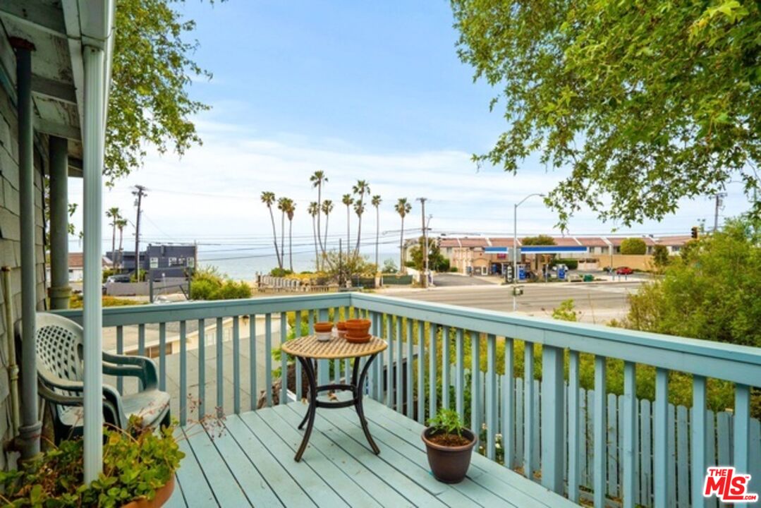 3945 Las Flores Canyon Road Malibu, CA 90265 - Photo 6 of 45 a view of balcony with furniture and trees