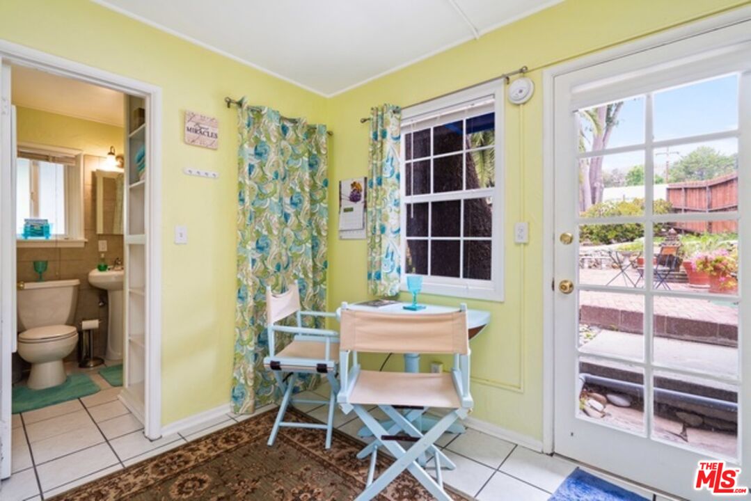 3945 Las Flores Canyon Road Malibu, CA 90265 - Photo 10 of 45 a room with furniture and a window