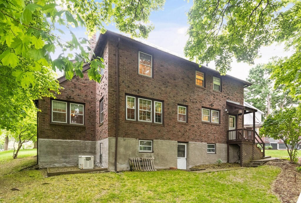 5 Hosmer Circle Newton, MA 02465 - Photo 29 of 32 front view of a house with a yard