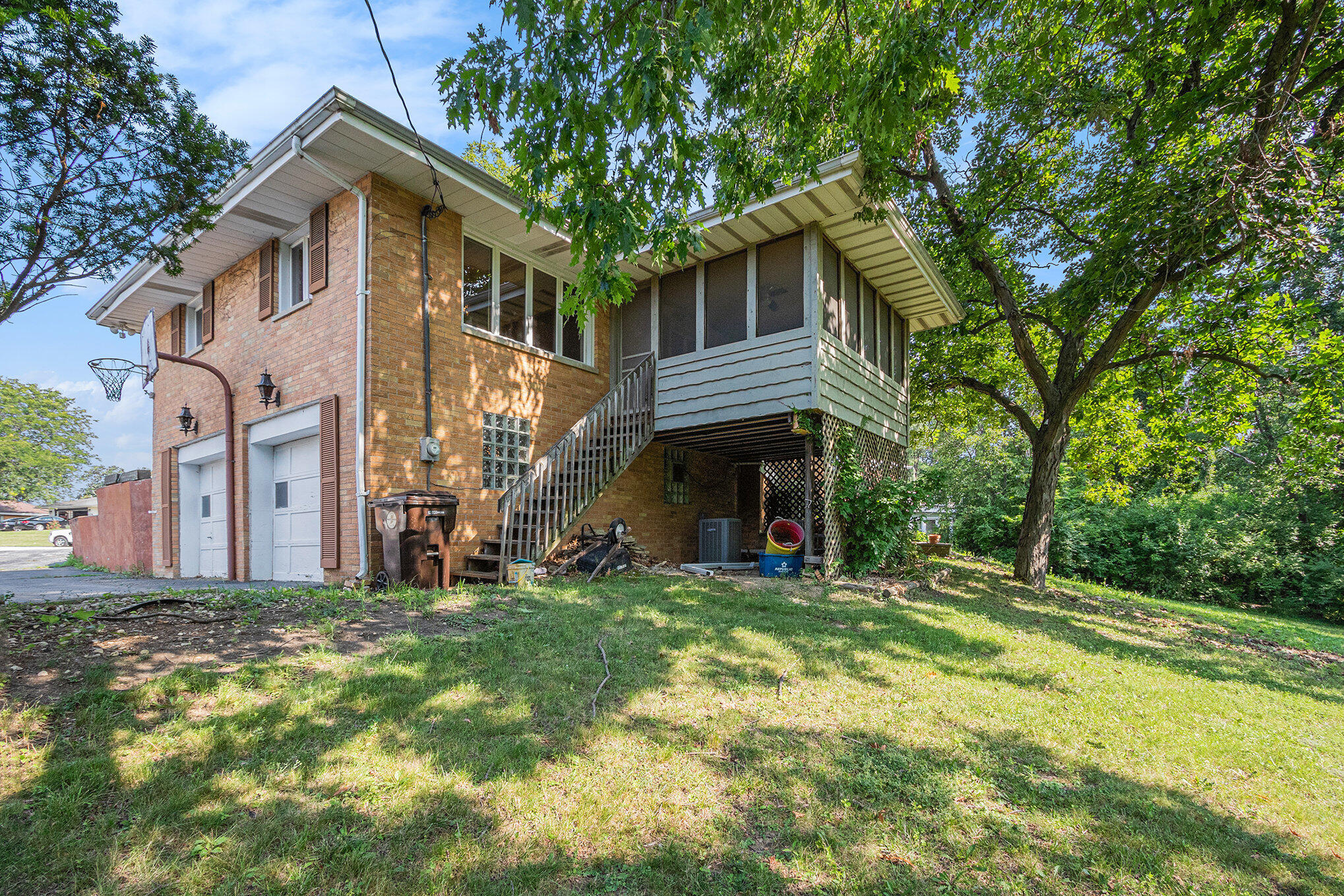 1405 West 125th Court Crown Point, IN 46307 - Photo 13 of 16 a front view of a house with a yard