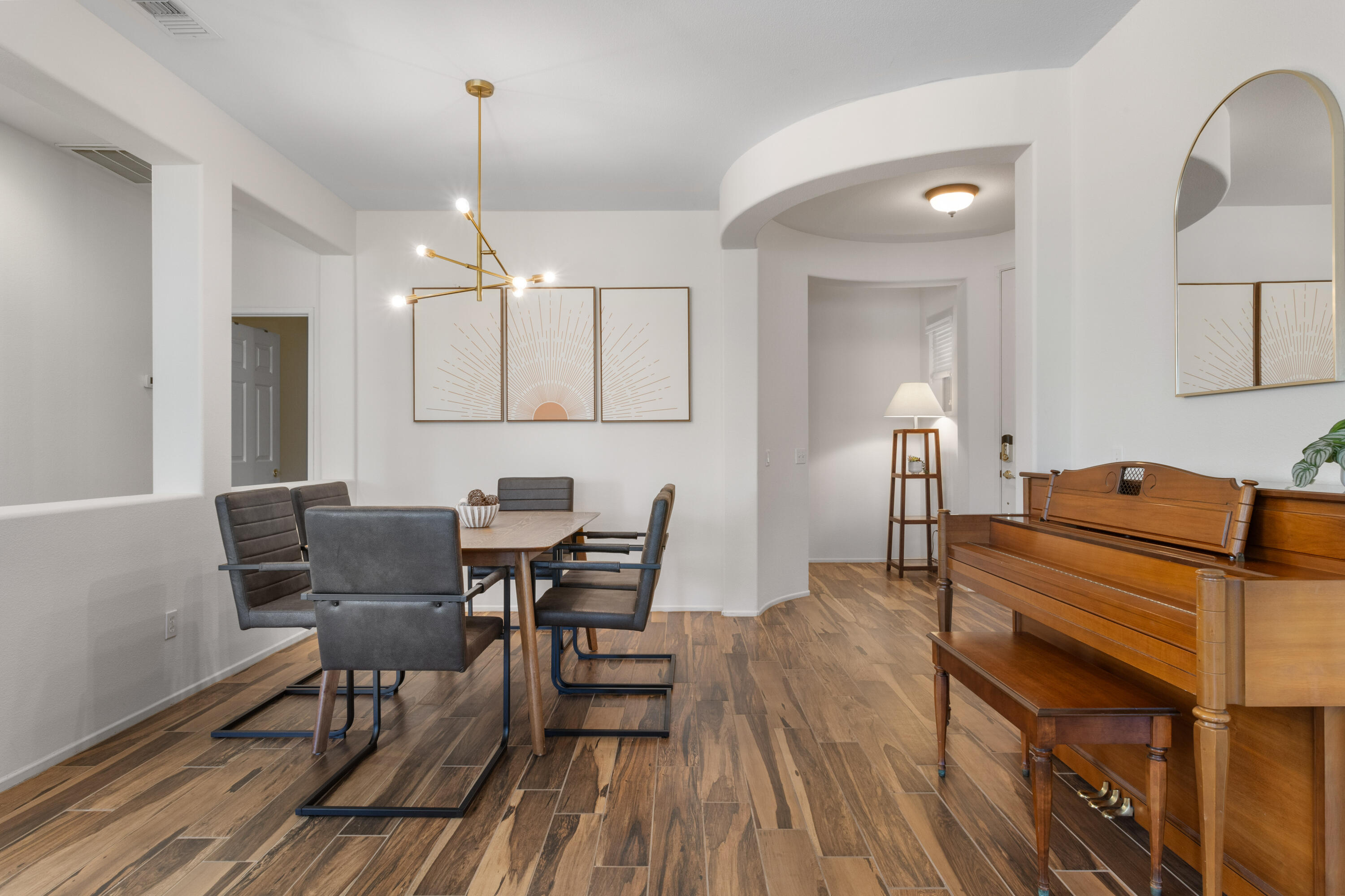 82664 Heston Drive Indio, CA 92201 - Photo 14 of 75 a view of a a dining room with furniture window and wooden floor