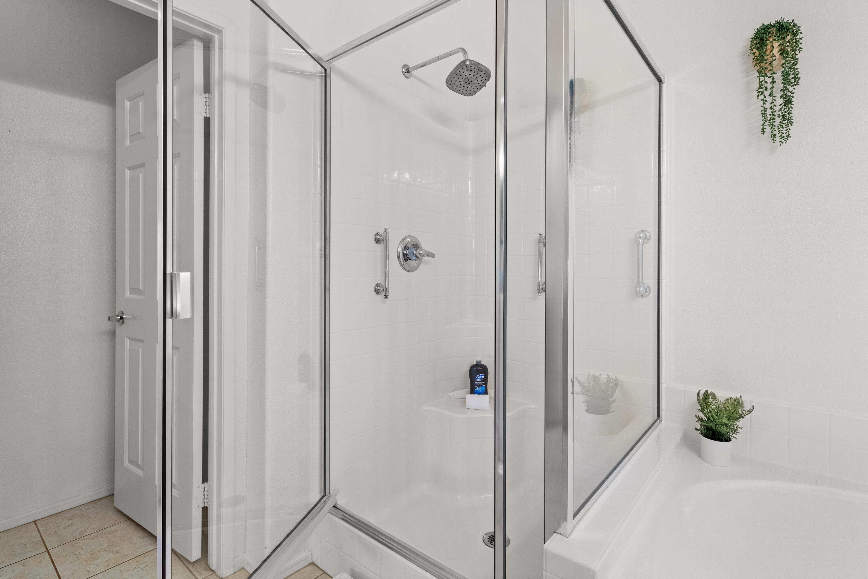 82664 Heston Drive Indio, CA 92201 - Photo 40 of 75 a bathroom with a shower and a bath tub