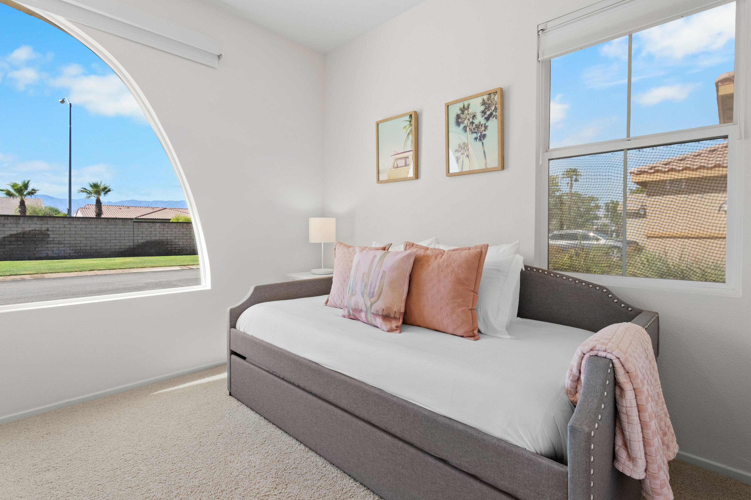 82664 Heston Drive Indio, CA 92201 - Photo 54 of 75 a bedroom with a large bed and a window