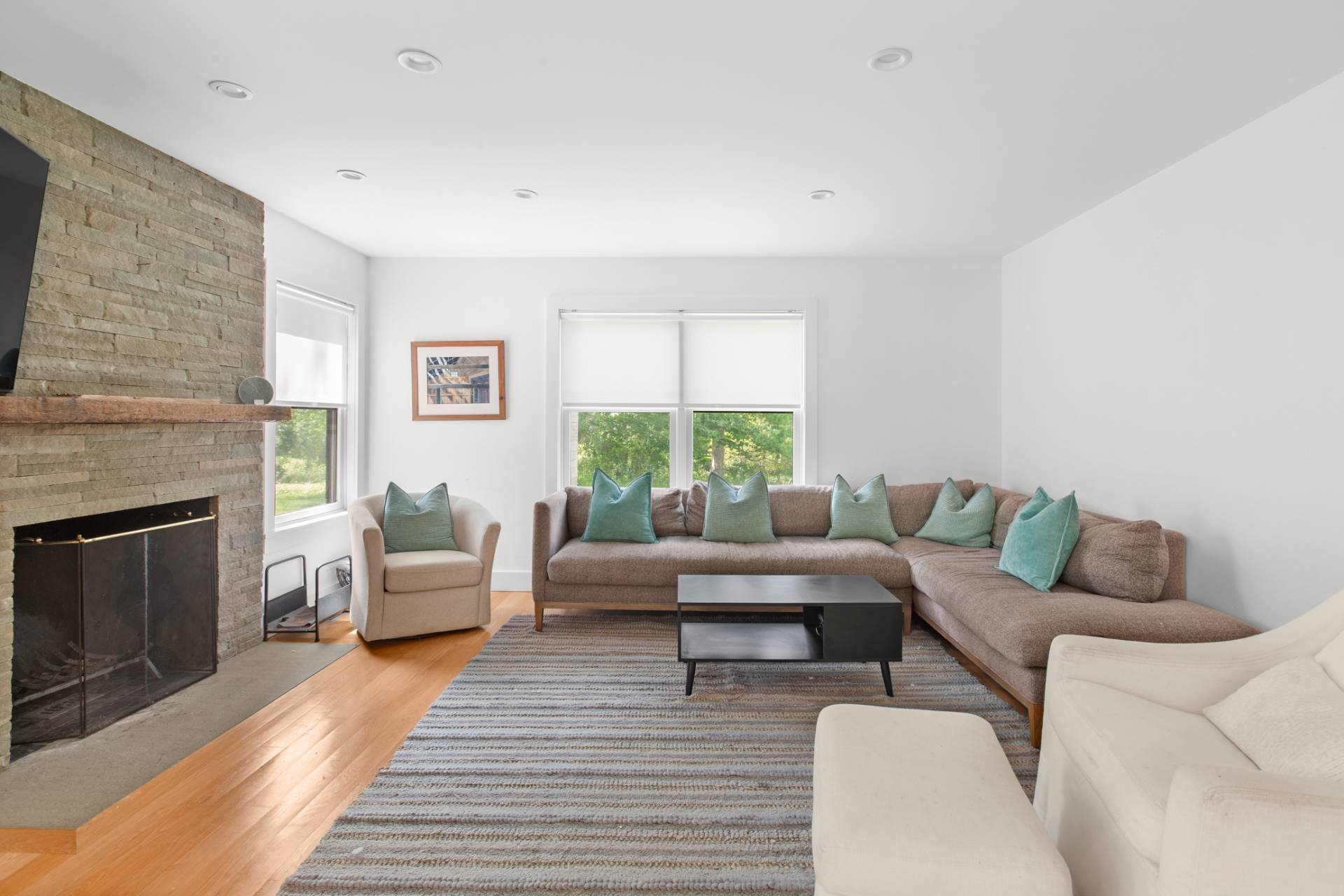 87 Accabonac Road East Hampton, NY 11937 - Photo 3 of 21 a living room with furniture and a fireplace