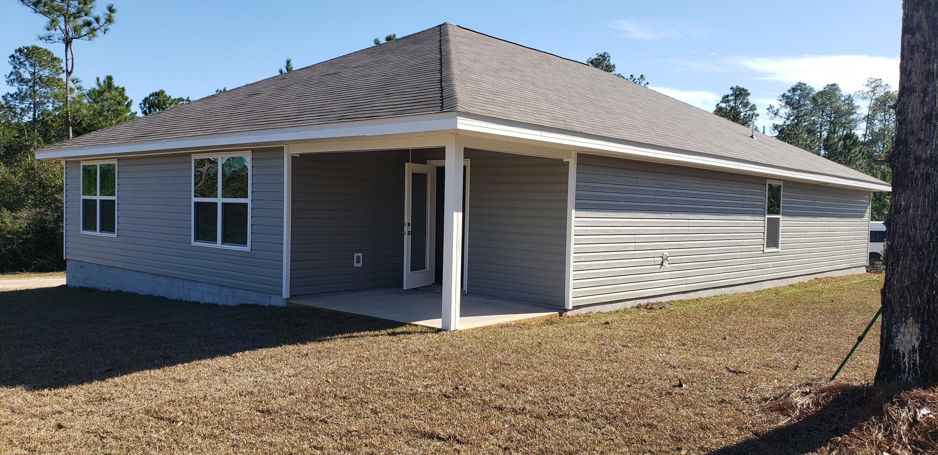 4659 Honor Guard Way Crestview, FL 32539 - Photo 16 of 25 a view of backyard of house