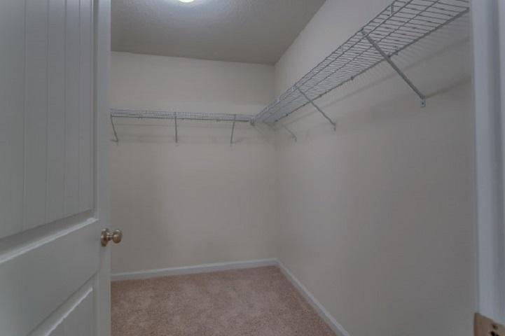 4659 Honor Guard Way Crestview, FL 32539 - Photo 8 of 25 a view of a room with racks on the wall