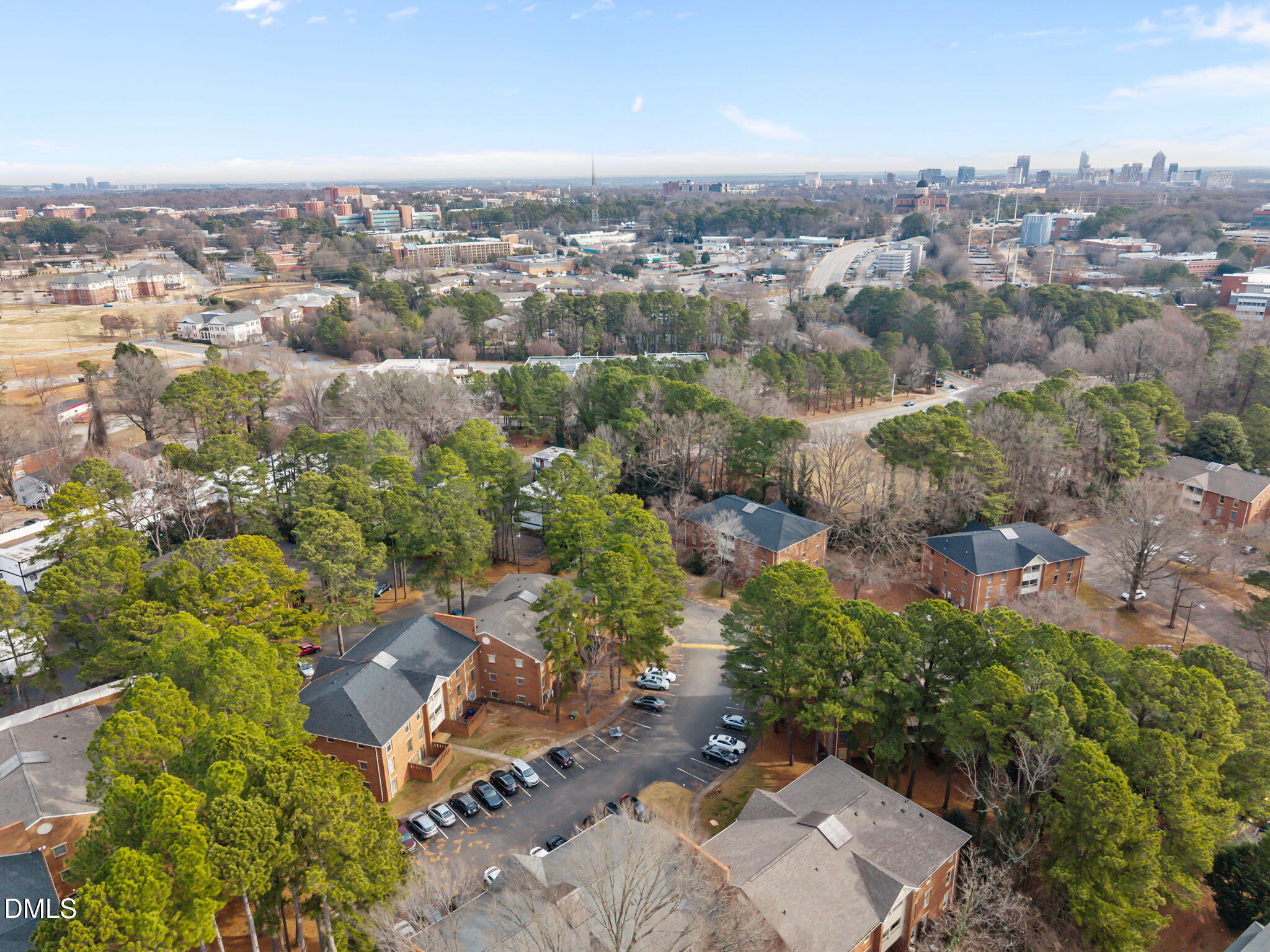 3527 Ivy Commons Drive, Unit 102 Raleigh, NC 27606 - Photo 5 of 33 8-web-or-mls-DJI_20260102102100_0848_D