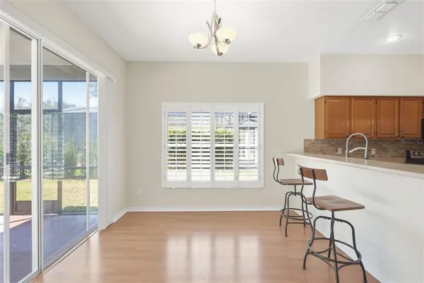 a very nice looking kitchen with a large window