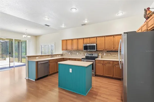 a bathroom with a sink and a shower curtain