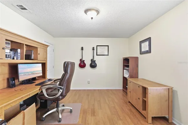 a living room with furniture and window