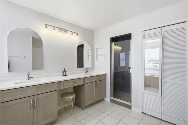 a view of a room with gym equipment and floor to ceiling window