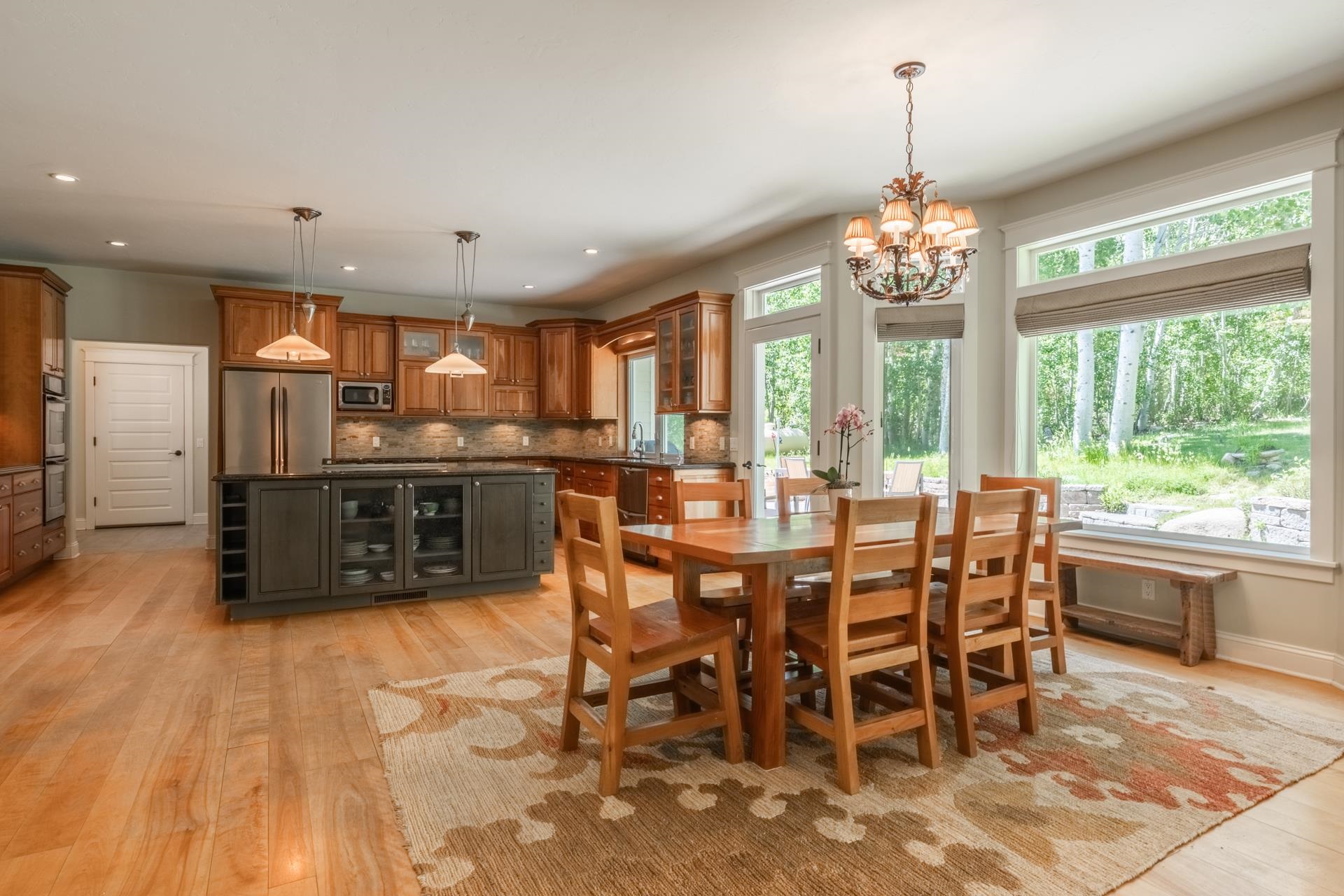 22 Juniper Drive, Unit 2 Mammoth Lakes, CA 93546 - Photo 11 of 50 a view of a dining room with furniture window and outside view