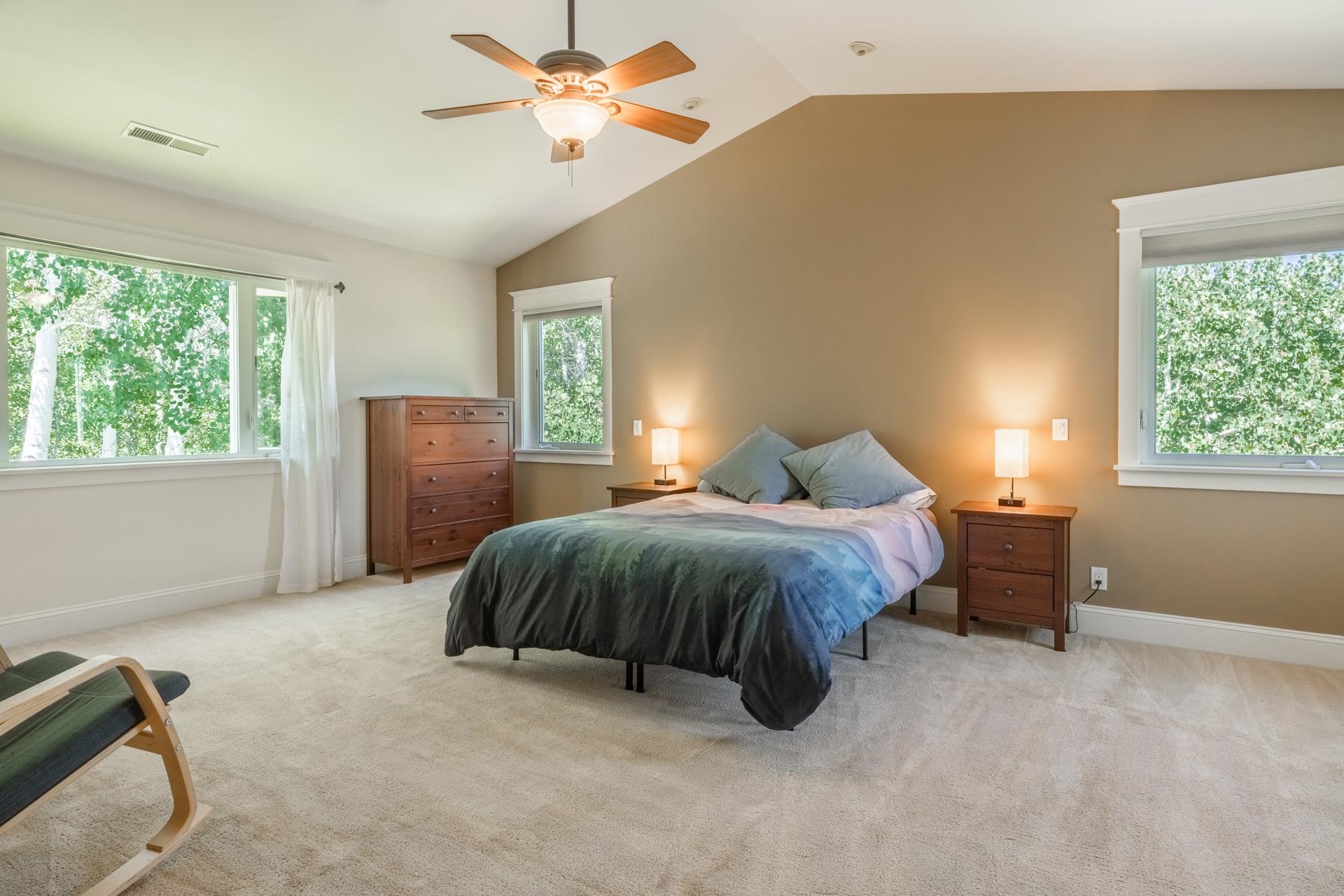 22 Juniper Drive, Unit 2 Mammoth Lakes, CA 93546 - Photo 19 of 50 a bedroom with a bed dresser and a window