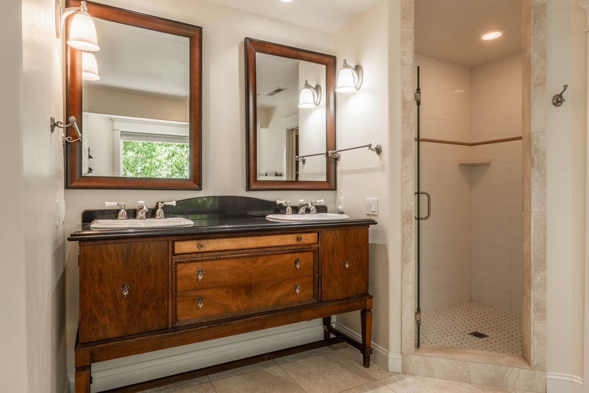22 Juniper Drive, Unit 2 Mammoth Lakes, CA 93546 - Photo 21 of 50 a bathroom with double vanity and a mirror