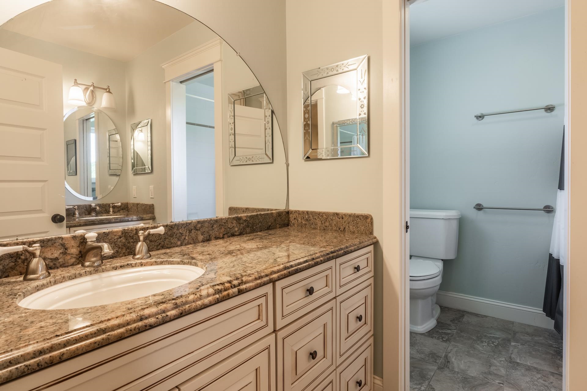 22 Juniper Drive, Unit 2 Mammoth Lakes, CA 93546 - Photo 24 of 50 a bathroom with a granite countertop sink toilet and shower
