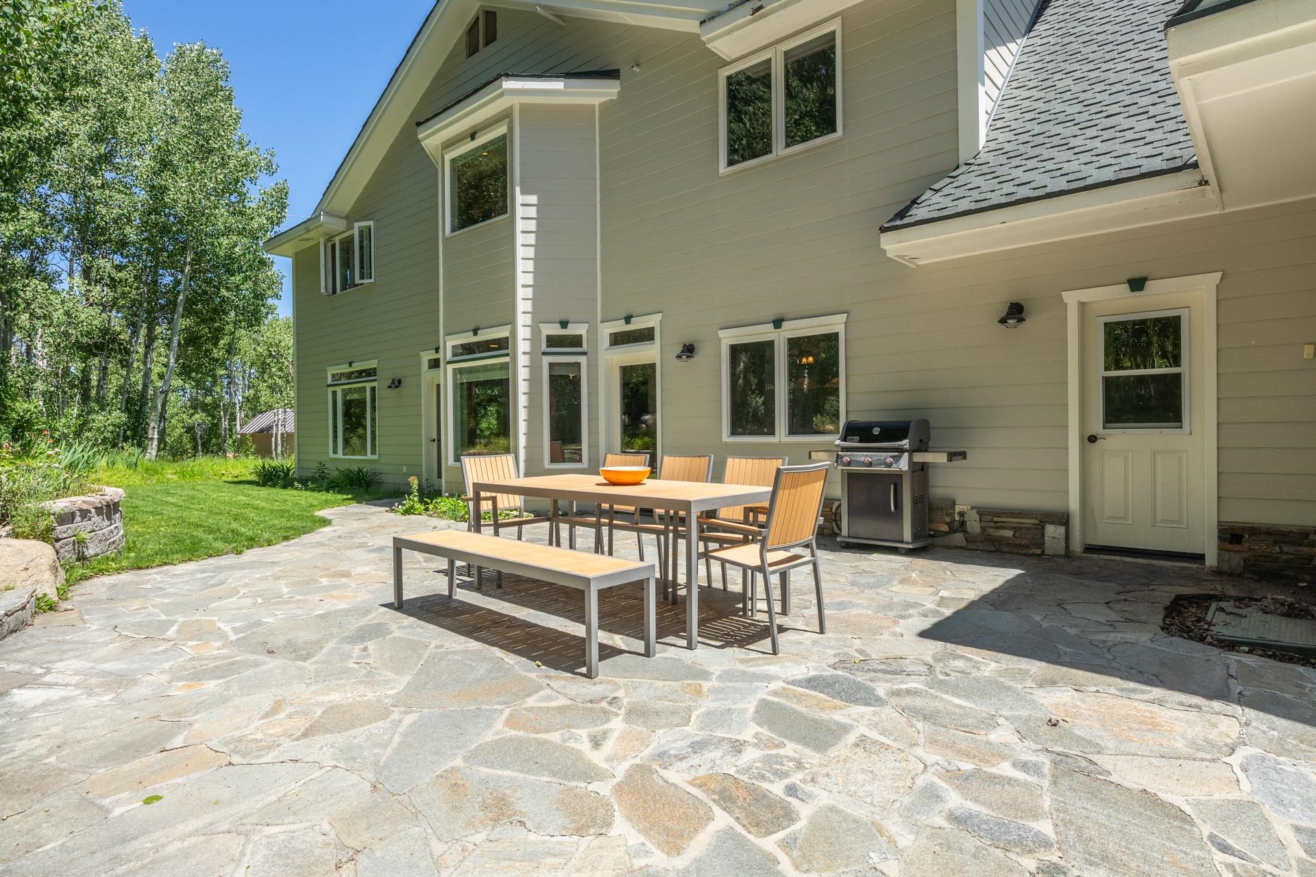 22 Juniper Drive, Unit 2 Mammoth Lakes, CA 93546 - Photo 31 of 50 a view of a house with backyard and porch