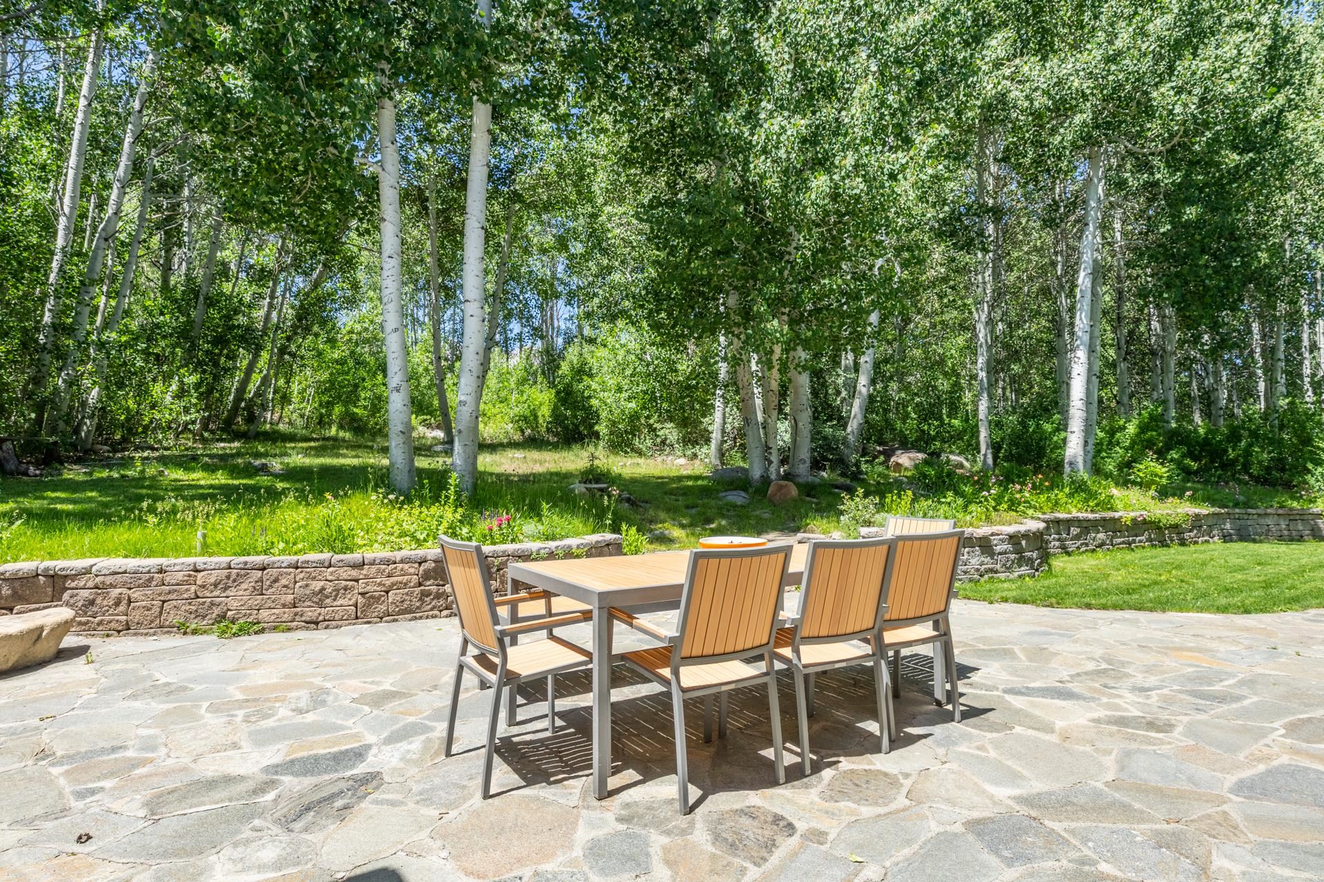 22 Juniper Drive, Unit 2 Mammoth Lakes, CA 93546 - Photo 32 of 50 a view of a chairs and backyard with a small yard