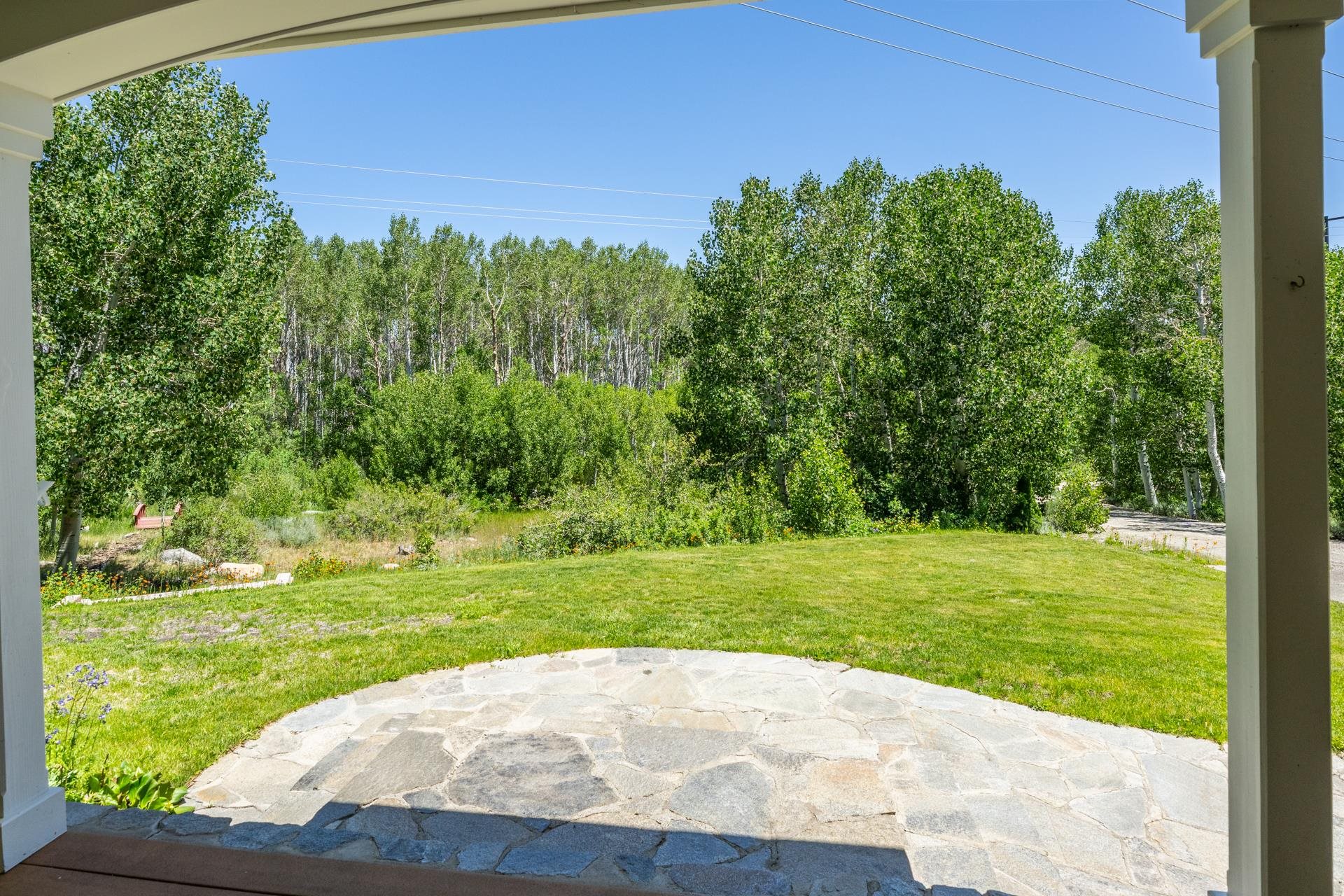 22 Juniper Drive, Unit 2 Mammoth Lakes, CA 93546 - Photo 35 of 50 a view of a grassy field with trees in the background