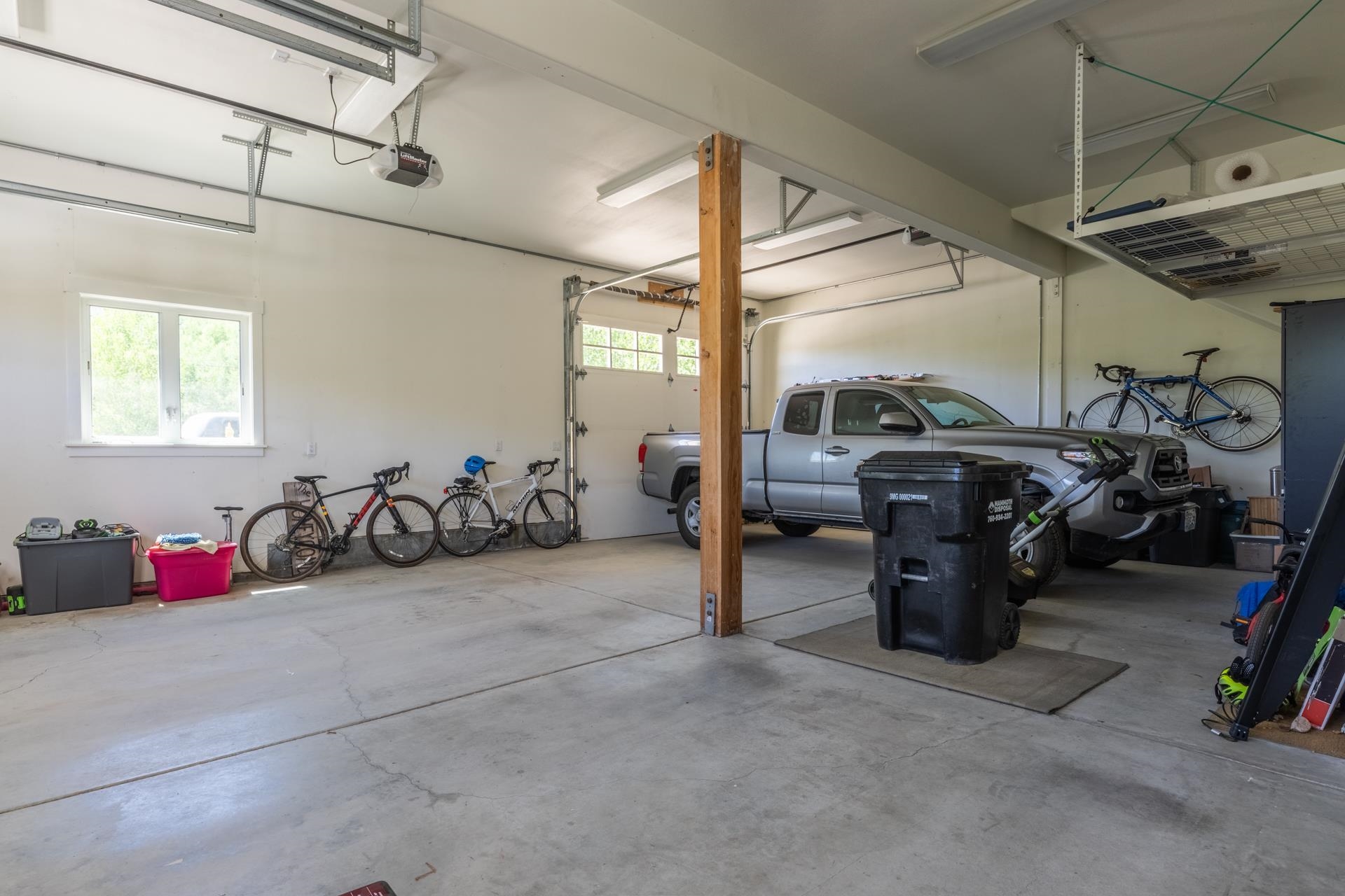 22 Juniper Drive, Unit 2 Mammoth Lakes, CA 93546 - Photo 45 of 50 a view of a garage with parked cars