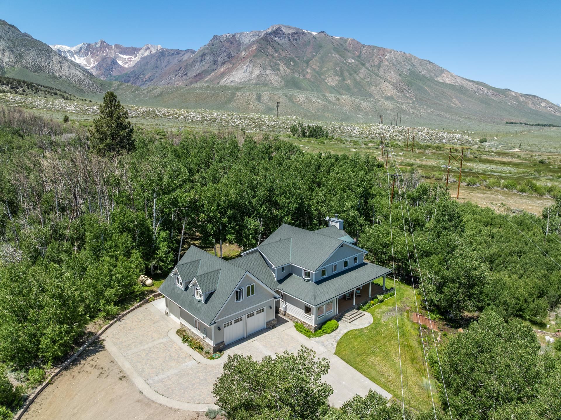 22 Juniper Drive, Unit 2 Mammoth Lakes, CA 93546 - Photo 49 of 50 an aerial view of a house with mountain view