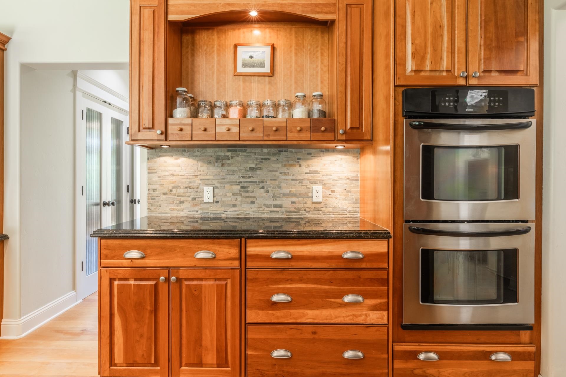 22 Juniper Drive, Unit 2 Mammoth Lakes, CA 93546 - Photo 10 of 50 a kitchen with granite countertop stainless steel appliances and stove