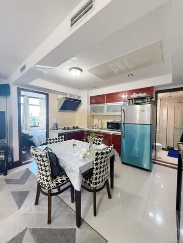 a view of a dining room with furniture