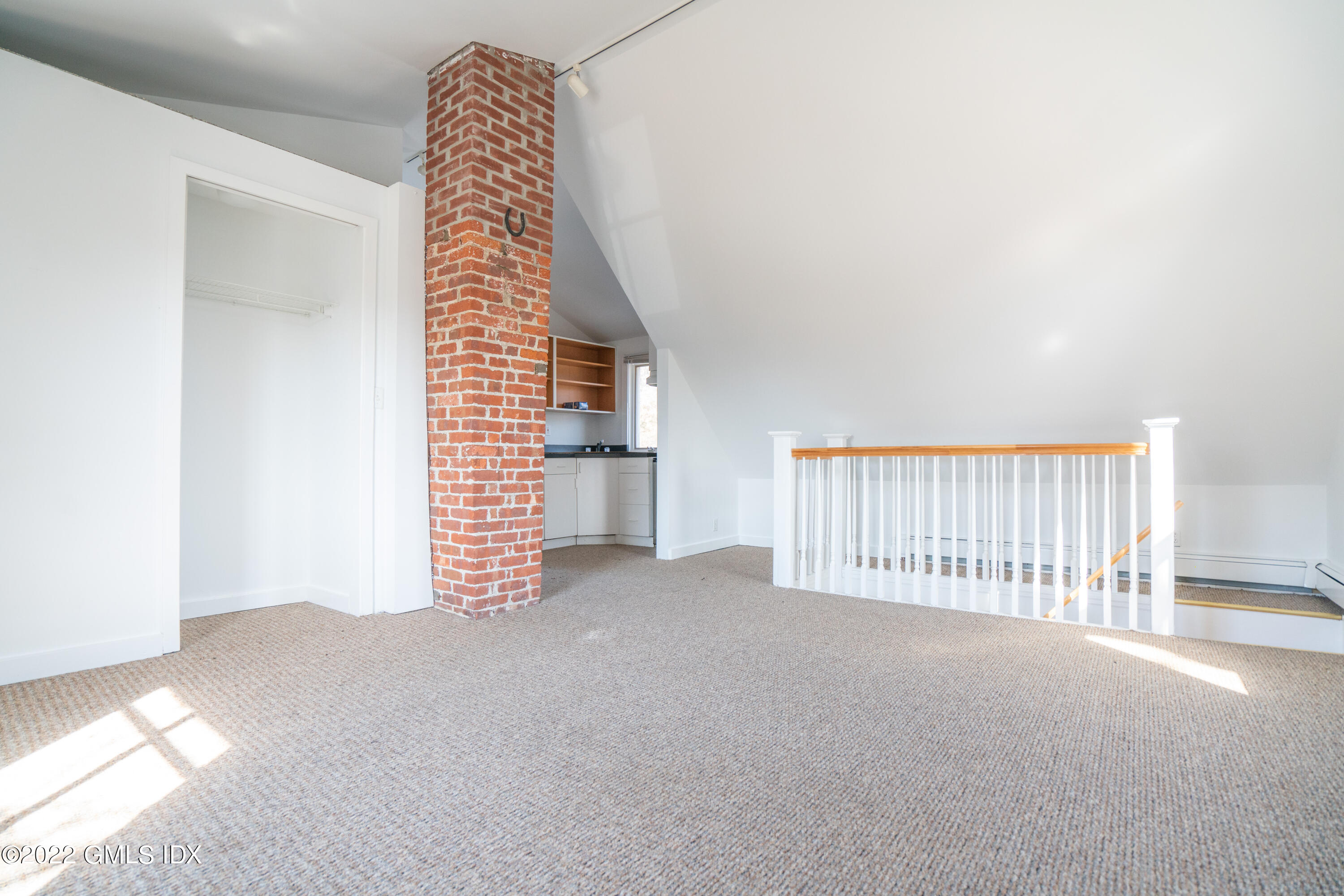 48 Sinawoy Road Cos Cob, CT 06807 - Photo 21 of 25 a view of an empty room with a window