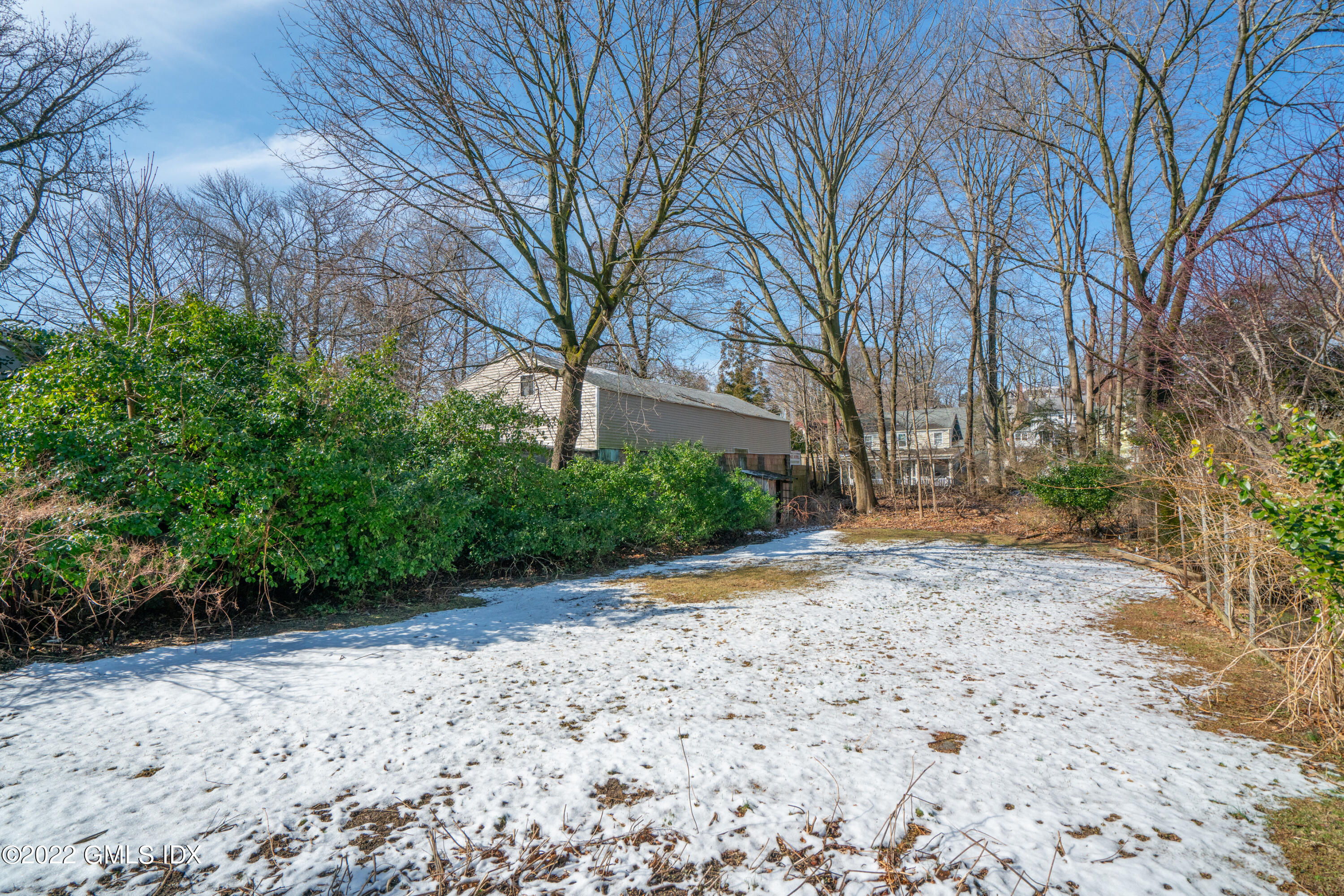 48 Sinawoy Road Cos Cob, CT 06807 - Photo 24 of 25 a view of a yard with plants and trees