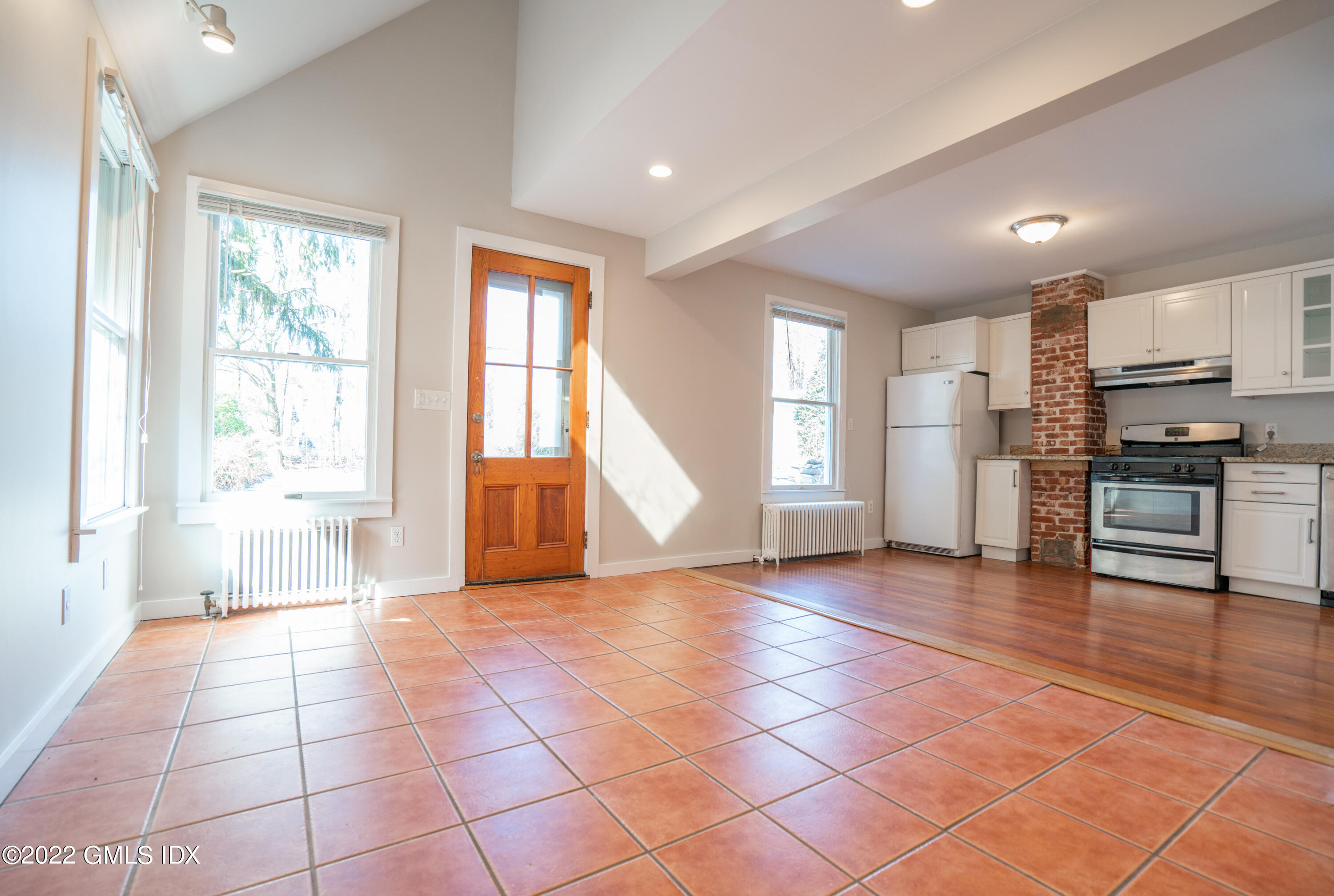 48 Sinawoy Road Cos Cob, CT 06807 - Photo 8 of 25 a view of an empty room with a window