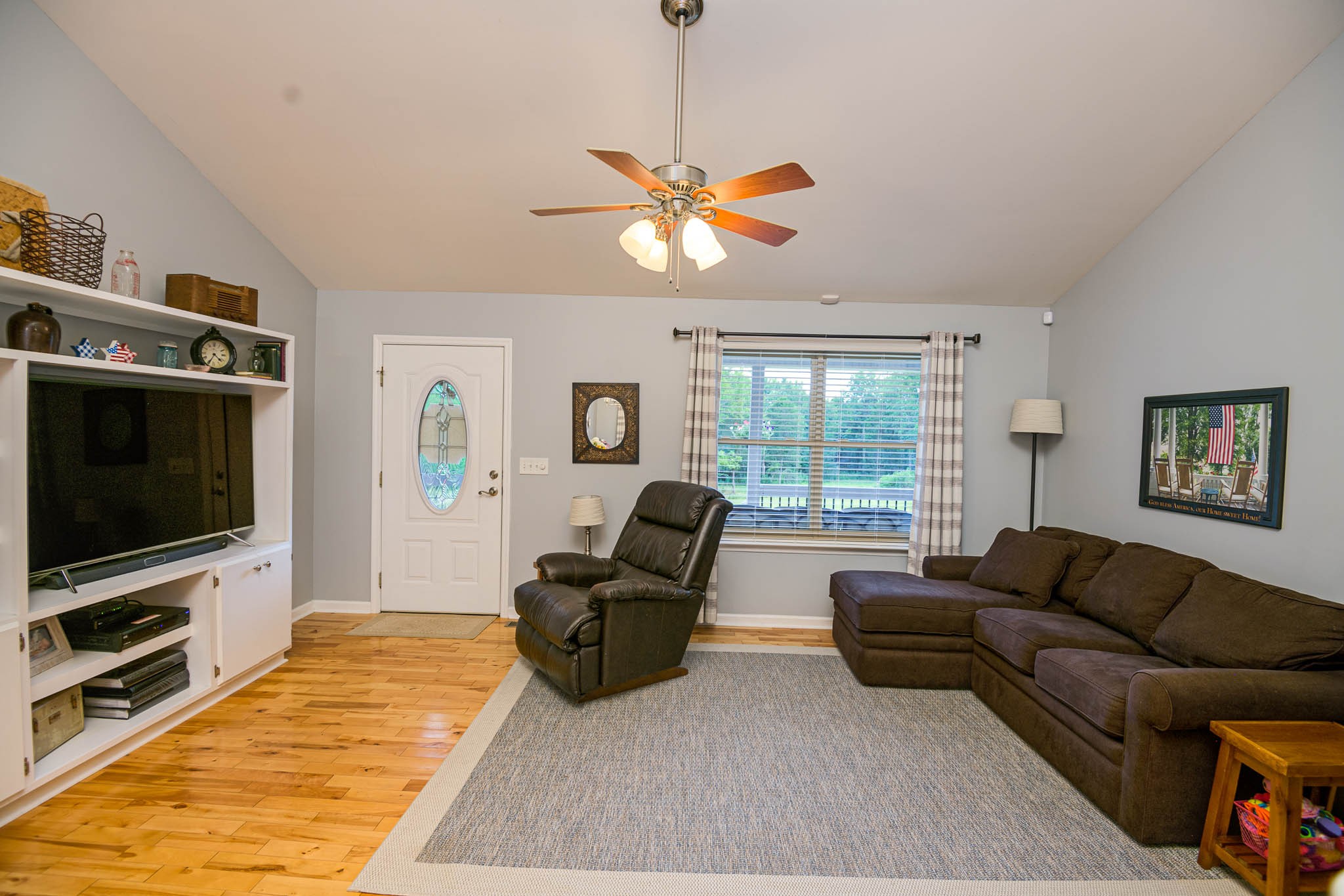 2245 Lower Helton Road Alexandria, TN 37012 - Photo 20 of 43 a living room with furniture and a flat screen tv