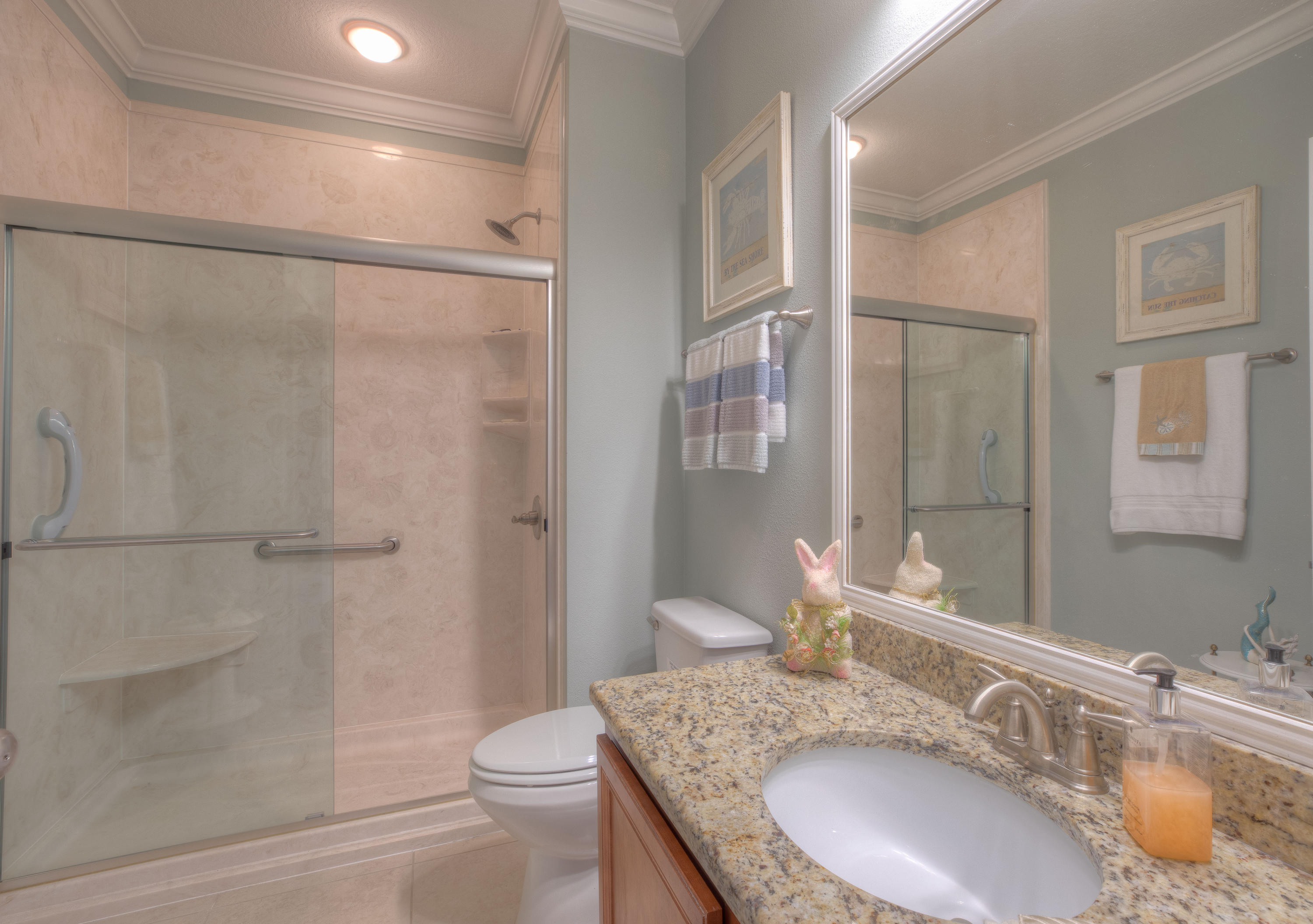 456 Pin Oak Loop Santa Rosa Beach, FL 32459 - Photo 14 of 32 a bathroom with a granite countertop sink toilet and shower