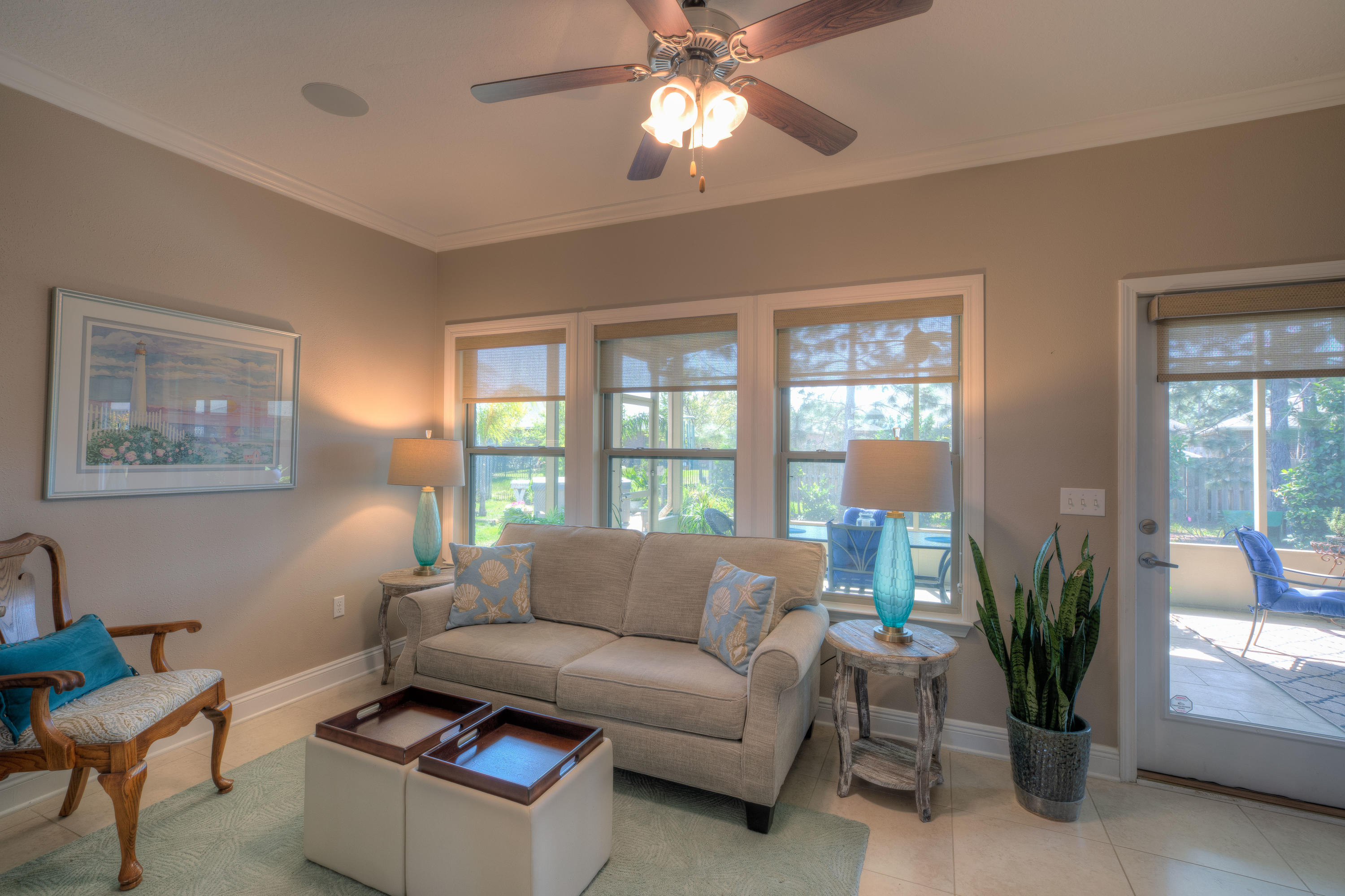 456 Pin Oak Loop Santa Rosa Beach, FL 32459 - Photo 18 of 32 a living room with furniture and a large window