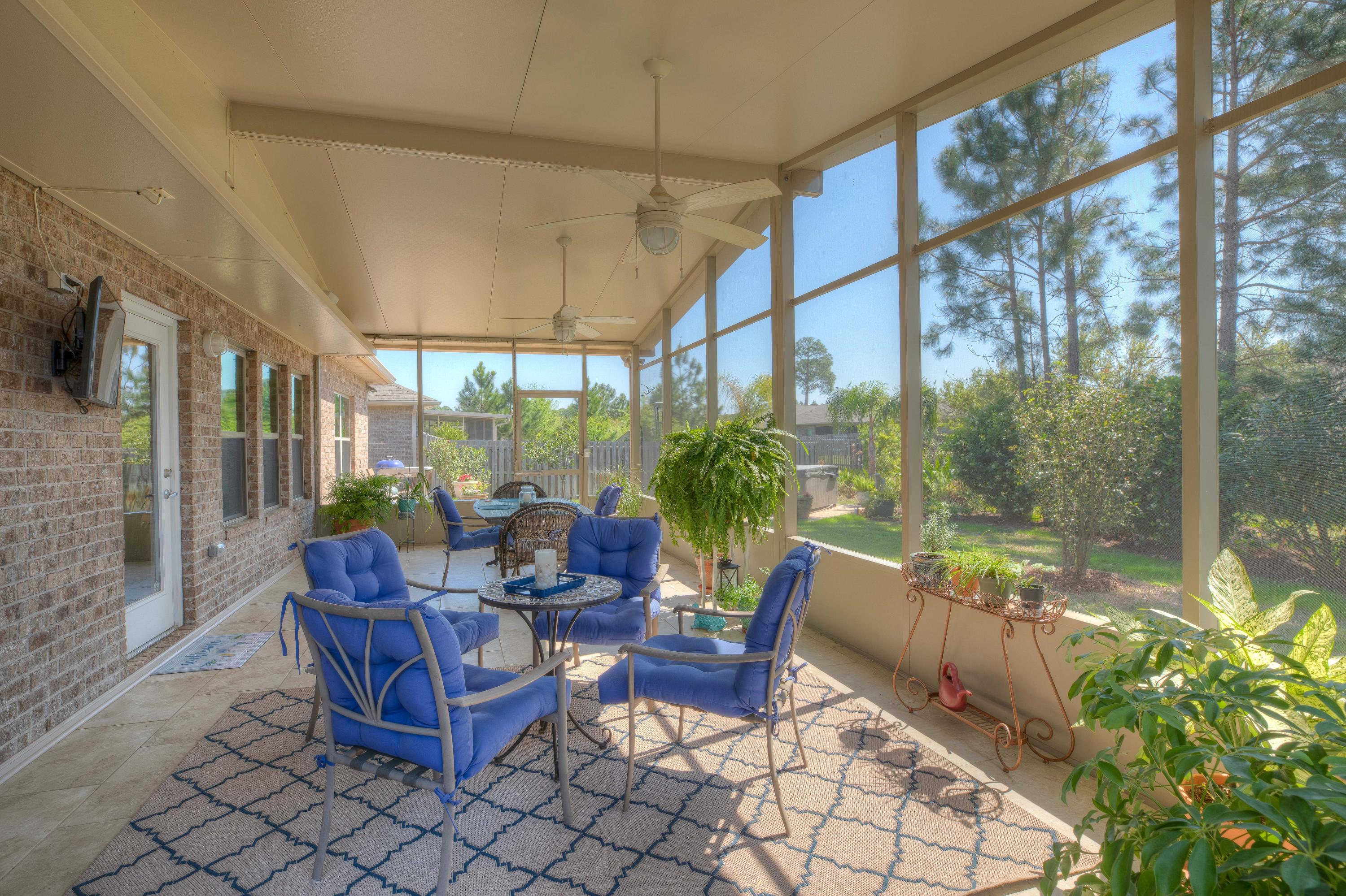 456 Pin Oak Loop Santa Rosa Beach, FL 32459 - Photo 29 of 32 a building outdoor space with patio furniture