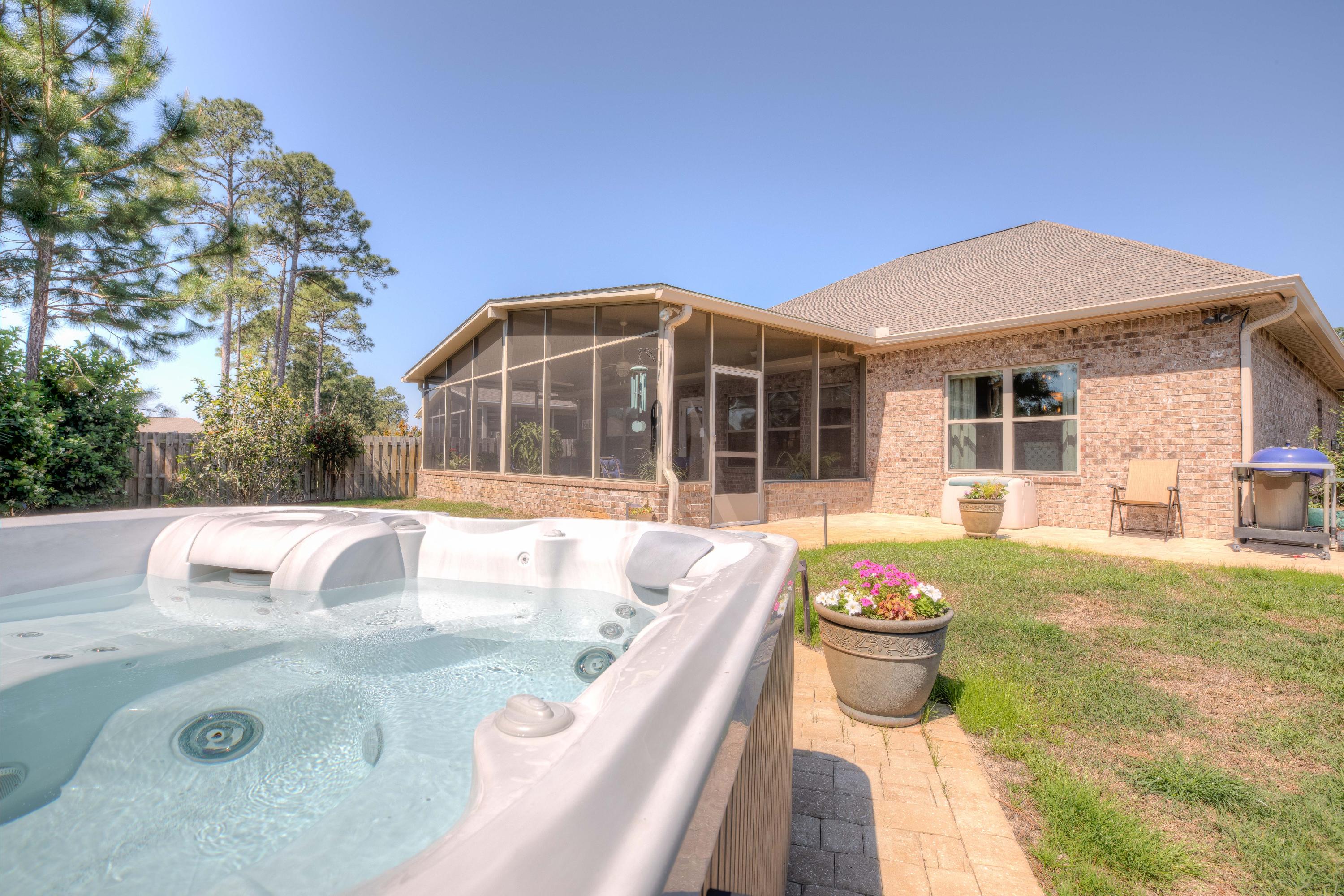 456 Pin Oak Loop Santa Rosa Beach, FL 32459 - Photo 32 of 32 a front view of a house with a yard