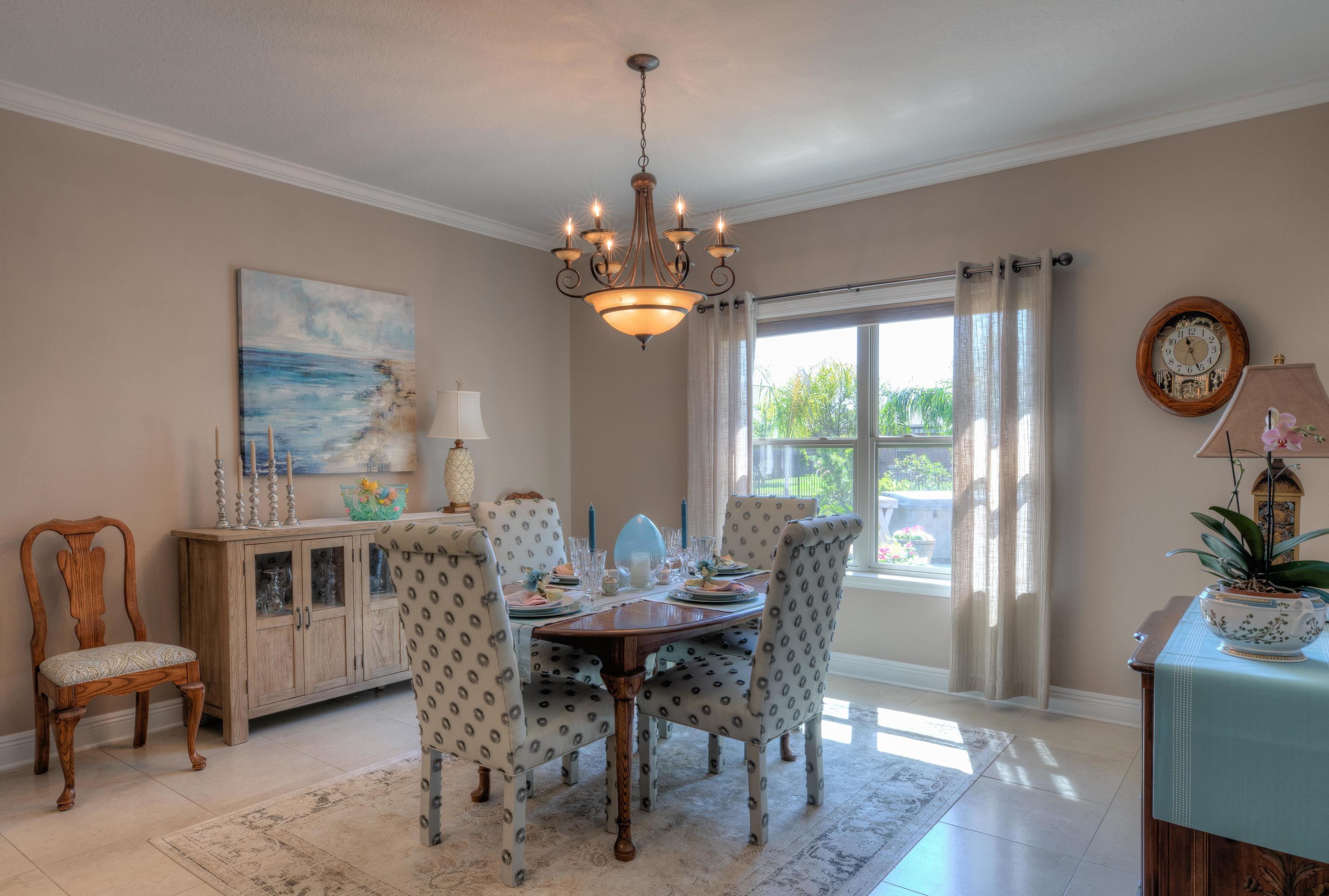 456 Pin Oak Loop Santa Rosa Beach, FL 32459 - Photo 9 of 32 a view of a dining room with furniture window and wooden floor