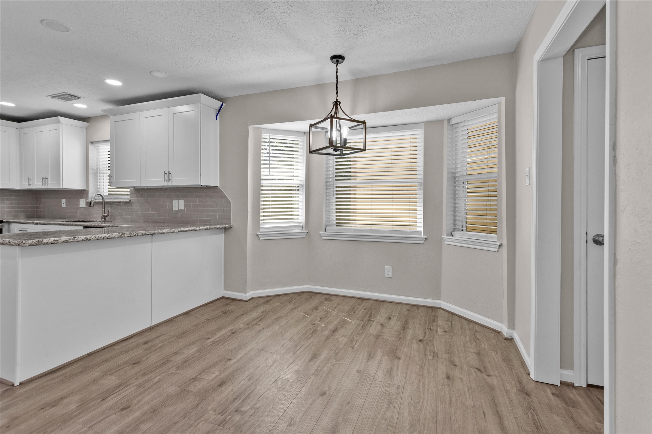 9115 Godstone Lane Spring, TX 77379 - Photo 17 of 46 Cozy breakfast nook with charming bay windows.