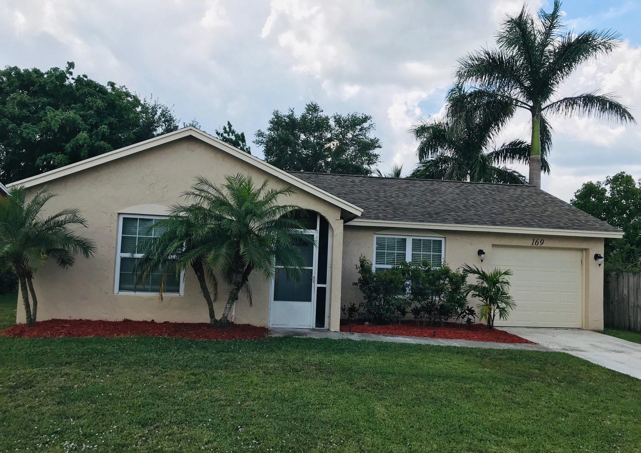 169 Banyan Circle Jupiter, FL 33458 - Photo 1 of 28 169 Banyan front