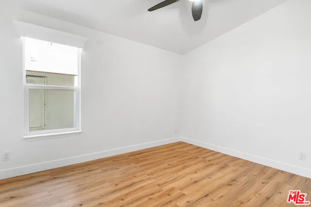 an empty room with window
