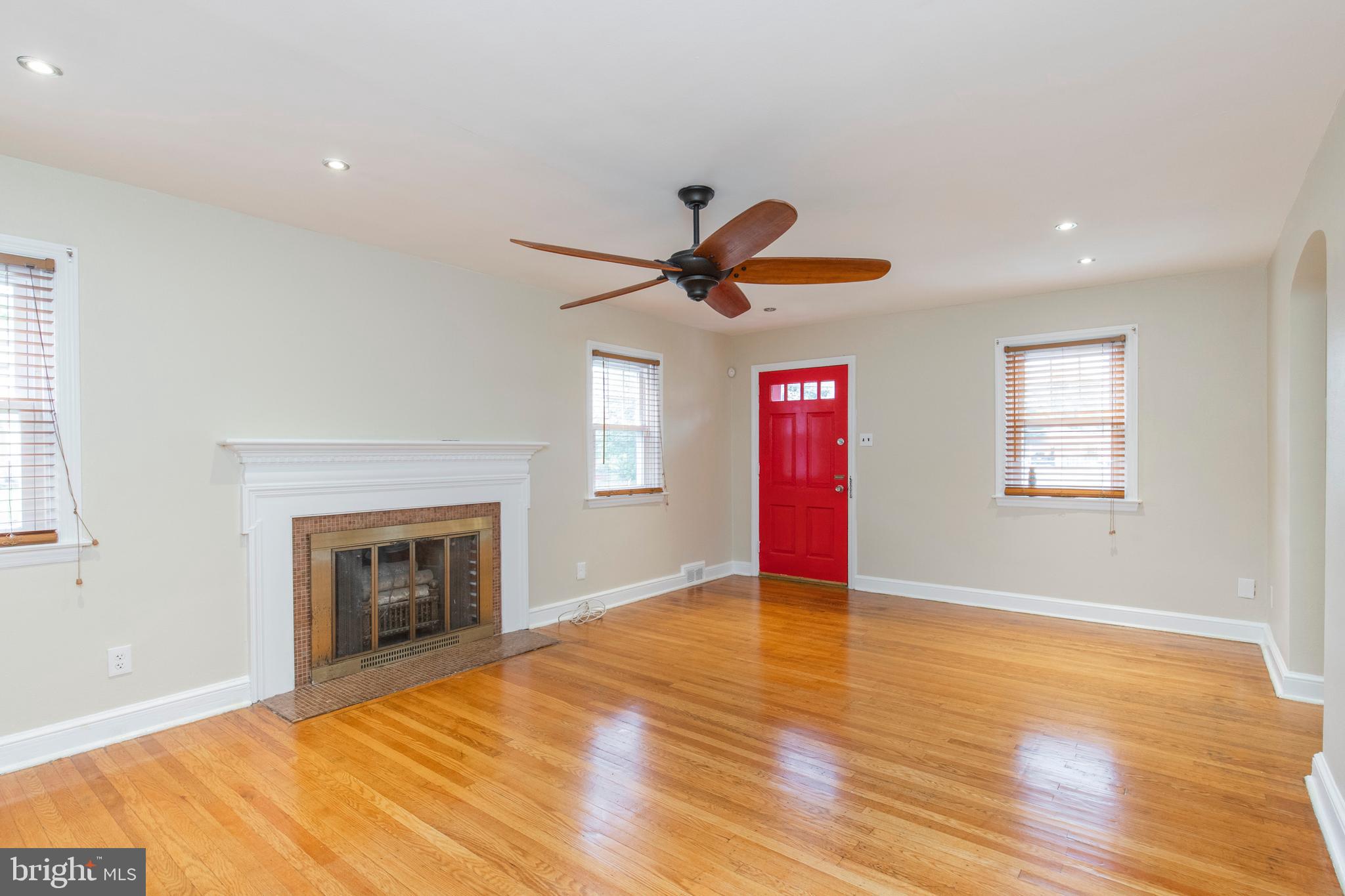 229 West Providence Road Aldan, PA 19018 - Photo 26 of 41 living room with wood burning fireplace.