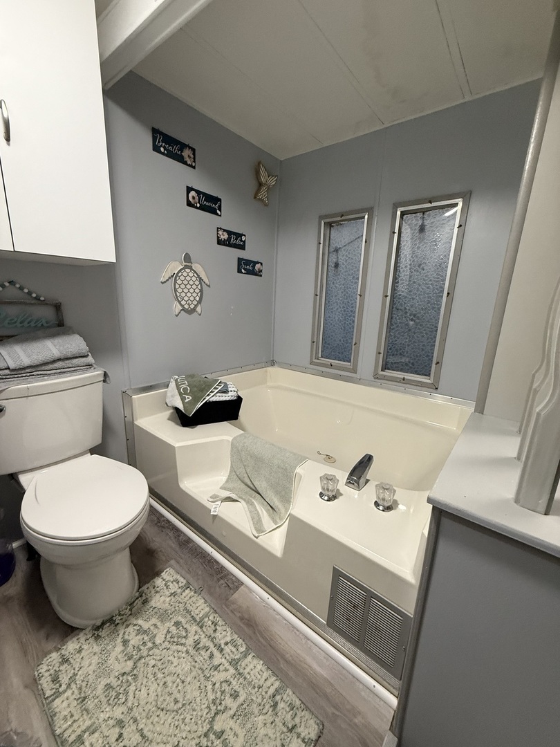 516 Prairie Road Matteson, IL 60443 - Photo 7 of 25 a bathroom with a sink and a toilet
