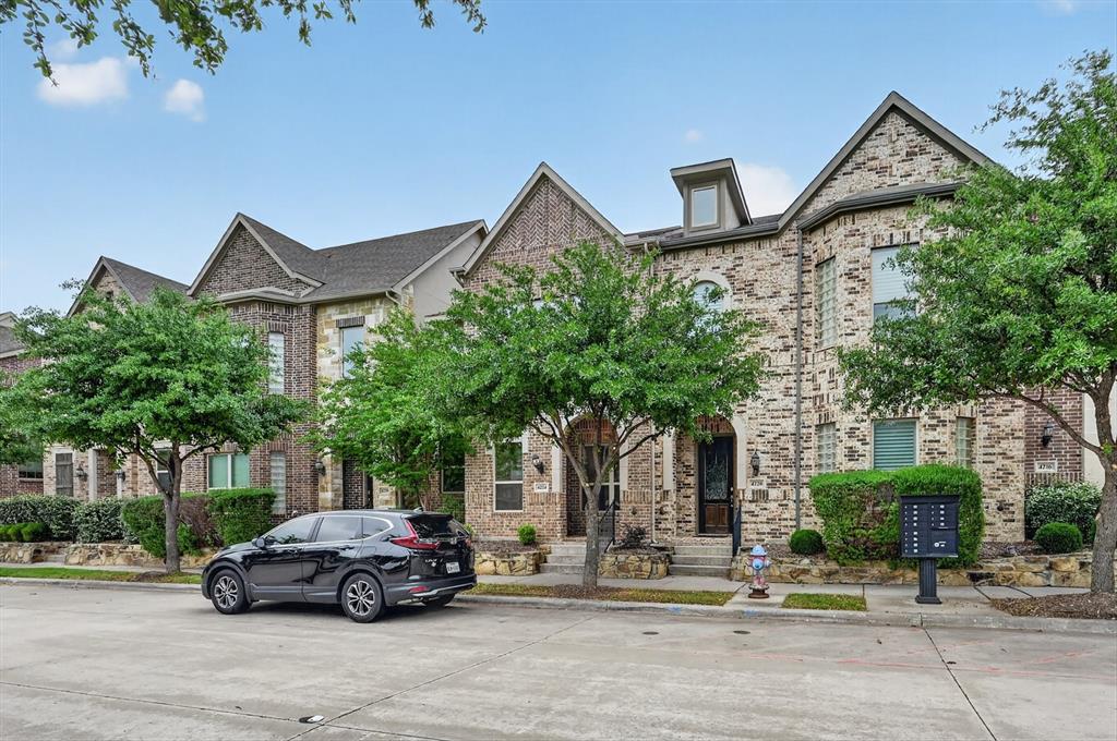 4224 Riverside Drive Flower Mound, TX 75028 - Photo 2 of 23 a car parked in front of a house