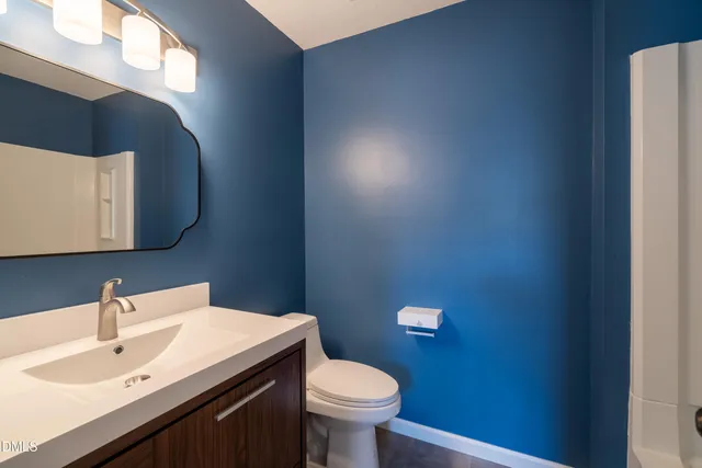 a bathroom with a sink and a toilet